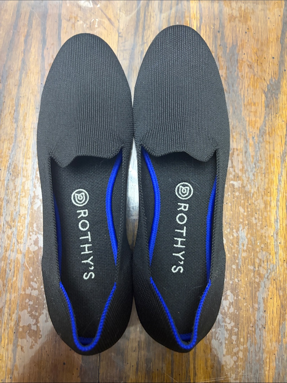 Rothy's Women’s  Black Slip-On Loafers with Blue Trim